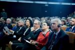 Goście siedzący podczas konferencji 