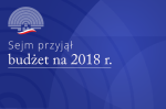 Napis na granatowym tle „Sejm przyjął budżet na 2018 r.